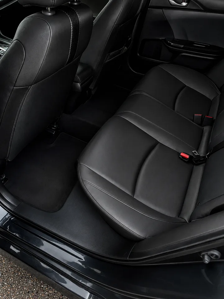 Clean black leather rear vehicle interior