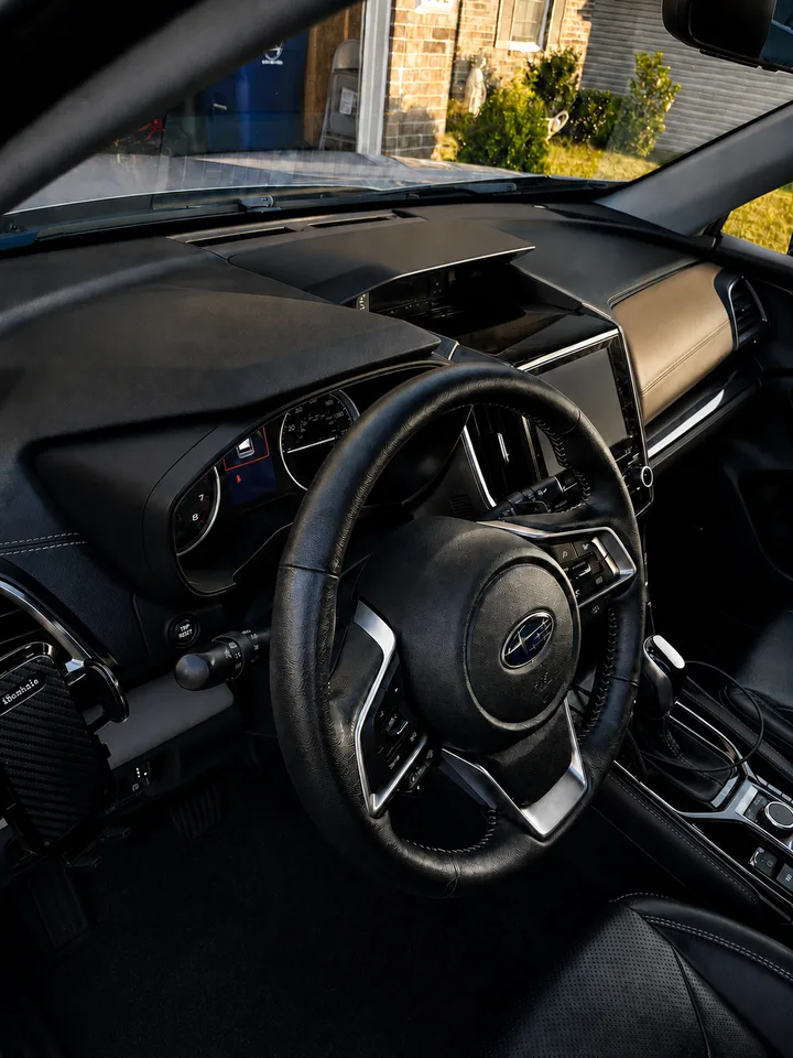 Professionally detailed black vehicle interior